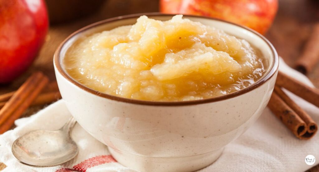 A serving of cinnamon applesauce in a white bowl