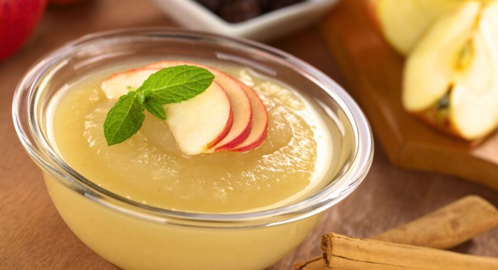 Fresh apples, cinnamon, and ingredients ready to make homemade cinnamon applesauce