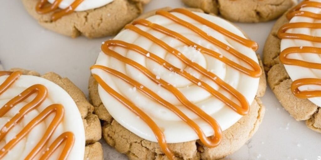 Soft and chewy caramel cheesecake cookies topped with caramel and sea salt
