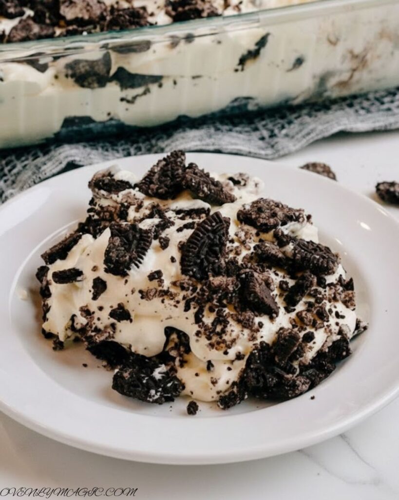 Close-up of creamy pudding layer with Oreo crumbs on top