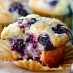 Homemade blueberry muffins with golden tops