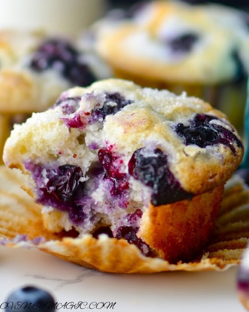 Homemade blueberry muffins with golden tops
