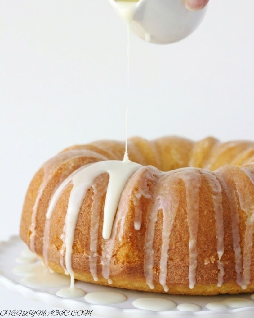 Moist lemon bundt cake with glossy lemon glaze drizzle