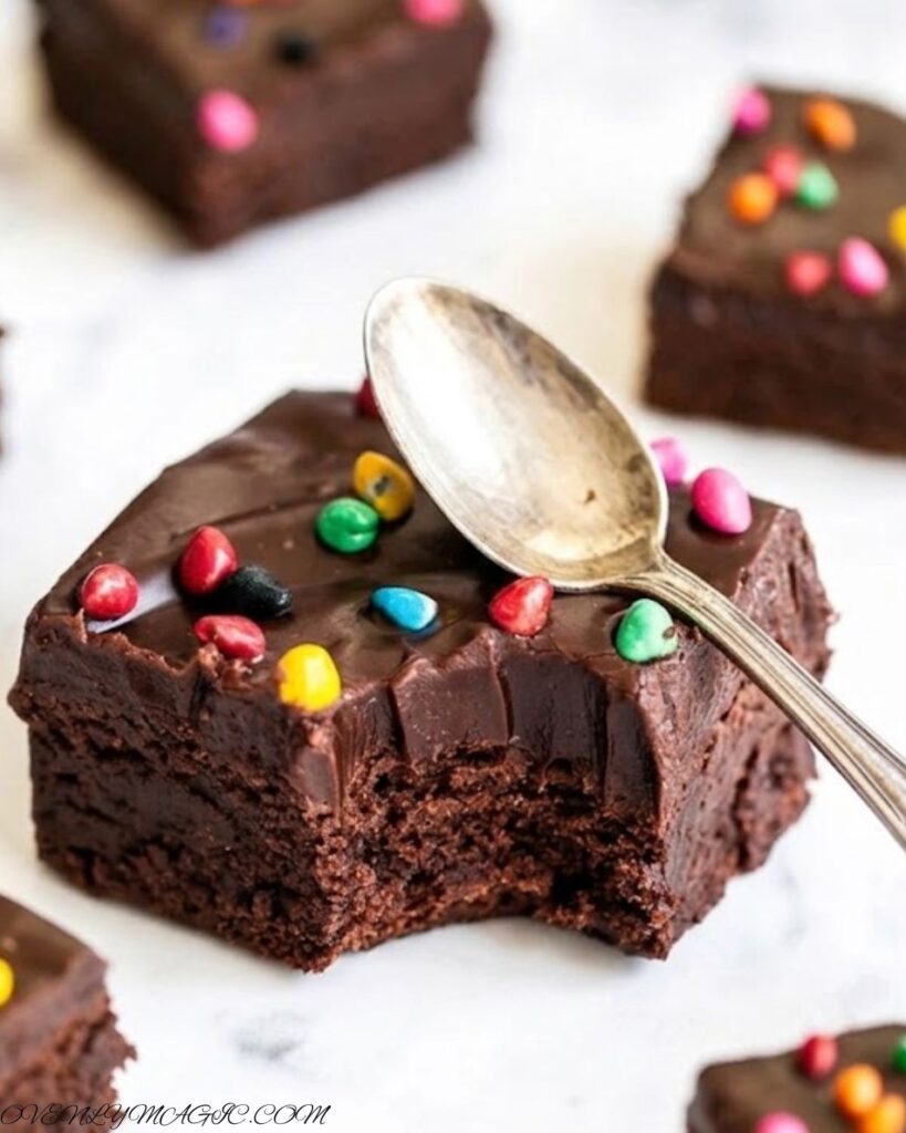 Thick and fudgy cosmic brownies topped with chocolate frosting